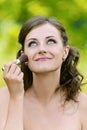 Woman puts on her face powder brush Royalty Free Stock Photo