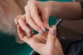 woman puts a plaster on her finger. Royalty Free Stock Photo