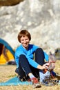 Woman puts shoes Royalty Free Stock Photo