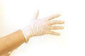 Woman puts on sterile medical gloves. Royalty Free Stock Photo