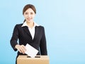 Woman putting ballot into voting box Royalty Free Stock Photo