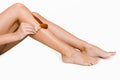 Woman putting depilatory wax on her leg Royalty Free Stock Photo