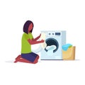 Woman putting dirty clothes into washing machine african american housewife doing housework laundry room cartoon Royalty Free Stock Photo