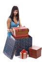 Woman putting giftbox into package Royalty Free Stock Photo