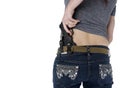 Woman Putting Hand Gun on her Hip Holster Royalty Free Stock Photo