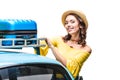 Woman putting luggage on car roof Royalty Free Stock Photo