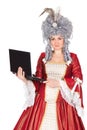 Woman in queen dress with laptop