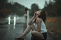 Woman in the rain and sad. Royalty Free Stock Photo