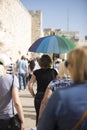 A woman with a rainbow-colored umbrella Royalty Free Stock Photo