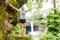 A Woman at The Rainbow Falls, Hilo, Wailuku River State Park, Big Island, Hawaii Royalty Free Stock Photo