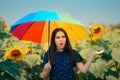 Woman with Rainbow Umbrella in Summer Sunflower Field Royalty Free Stock Photo