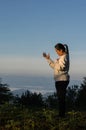 Woman raising his hands in worship. Christian Religion concept. Person on sunlight sky background. Christian female prayers to God Royalty Free Stock Photo