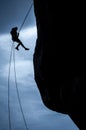 Woman rappeling silhouette