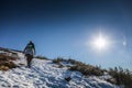 Woman Reaching the Top of Richardson Mountain in National Park o