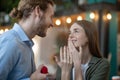 Woman reacting emotionaly to the receiving a proposal