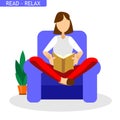 Woman read a book on armchair