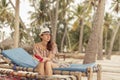 Woman reading a book on the beach Royalty Free Stock Photo