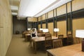 Woman Reading Book In Empty Library Royalty Free Stock Photo