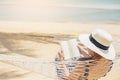 Woman reading a book on hammock beach in free time summer holiday Royalty Free Stock Photo