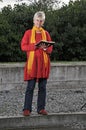 Woman reading book outdoors Royalty Free Stock Photo