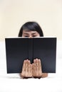 Woman reading a book seriously Royalty Free Stock Photo