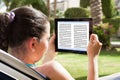 Woman reading ebook Royalty Free Stock Photo