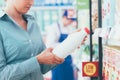 Woman reading food labels