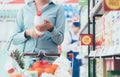 Woman reading food labels