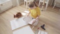 Woman reading manuals to assembling furniture