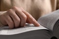 Woman reading new holy Bible, closeup view Royalty Free Stock Photo