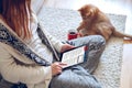 Woman reading news on tablet Royalty Free Stock Photo