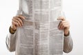 Woman reading newspaper on white background Royalty Free Stock Photo