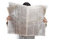 Woman reading newspaper on white background Royalty Free Stock Photo