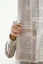 Woman reading newspaper on white background Royalty Free Stock Photo