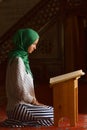 Woman reading Quran