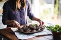 a woman reading a recipe for grilled portobello mushrooms