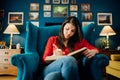 Woman reading/studying a foreign language from a book at home.Highlighting/Underlining difficult literature.Concentration problems