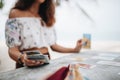 Woman is reading Tarot cards at the beach Royalty Free Stock Photo