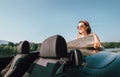 Woman reads a road map during her auto travel Royalty Free Stock Photo