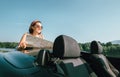 Woman reads a road map during her auto travel Royalty Free Stock Photo