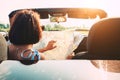 Woman reads roads map sitting in cabriolet car Royalty Free Stock Photo