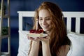 Woman ready to blow a birthday candle