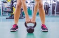 Woman ready to lift kettlebell in crossfit Royalty Free Stock Photo