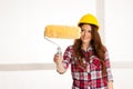 Woman ready to paint walls Royalty Free Stock Photo