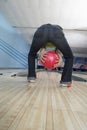 Woman Ready To Swing Bowling Ball Royalty Free Stock Photo