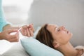 Woman receiving acupuncture treatment Royalty Free Stock Photo