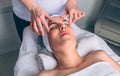 Woman receiving facial treatment on clinical center Royalty Free Stock Photo