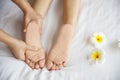 Woman receiving foot massage service from masseuse close up at hand and foot Royalty Free Stock Photo