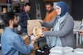 Woman Receiving Free Food at Refugee Help Center Royalty Free Stock Photo