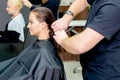 Woman receiving haircut. Royalty Free Stock Photo